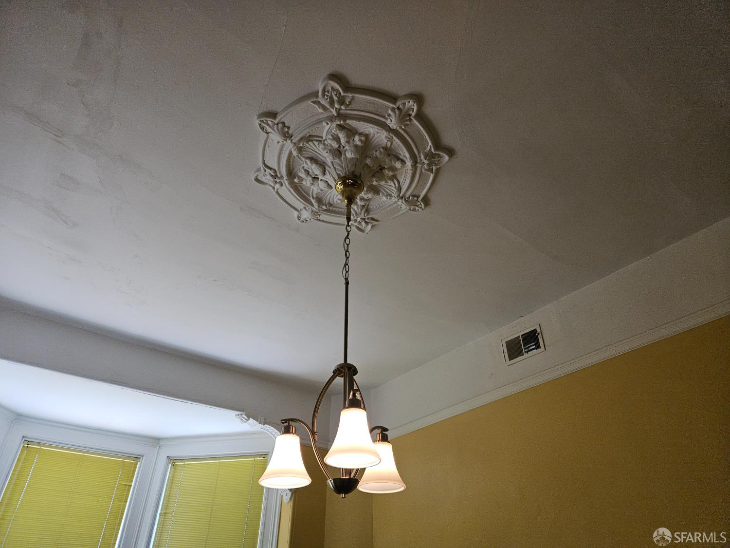 841-845 Fulton Street San Francisco, CA 94117 - Photo 22 of 32 a vase of flowers sitting on a table