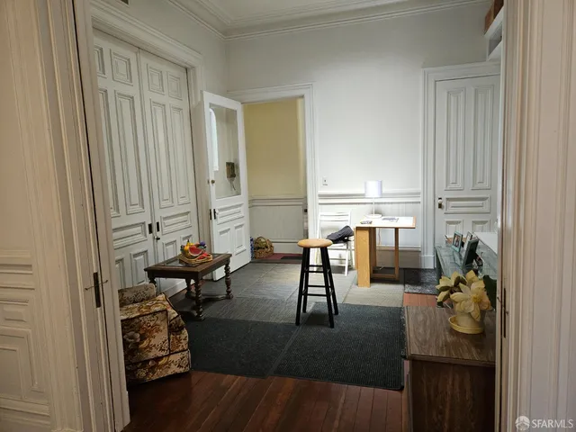 a view of balcony with couch and potted plants