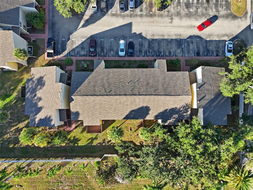 3405 Clark Road, Unit 205 Sarasota, FL 34231 - Photo 33 of 38 front view of a house with a yard