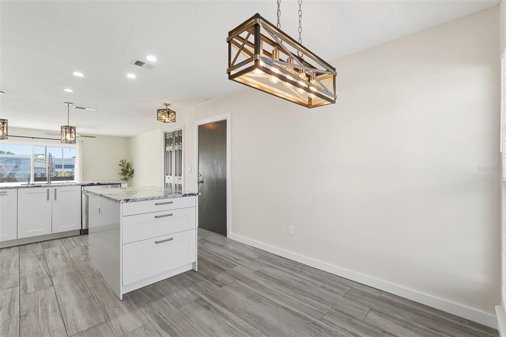 3405 Clark Road, Unit 205 Sarasota, FL 34231 - Photo 4 of 38 a room with storage and utility