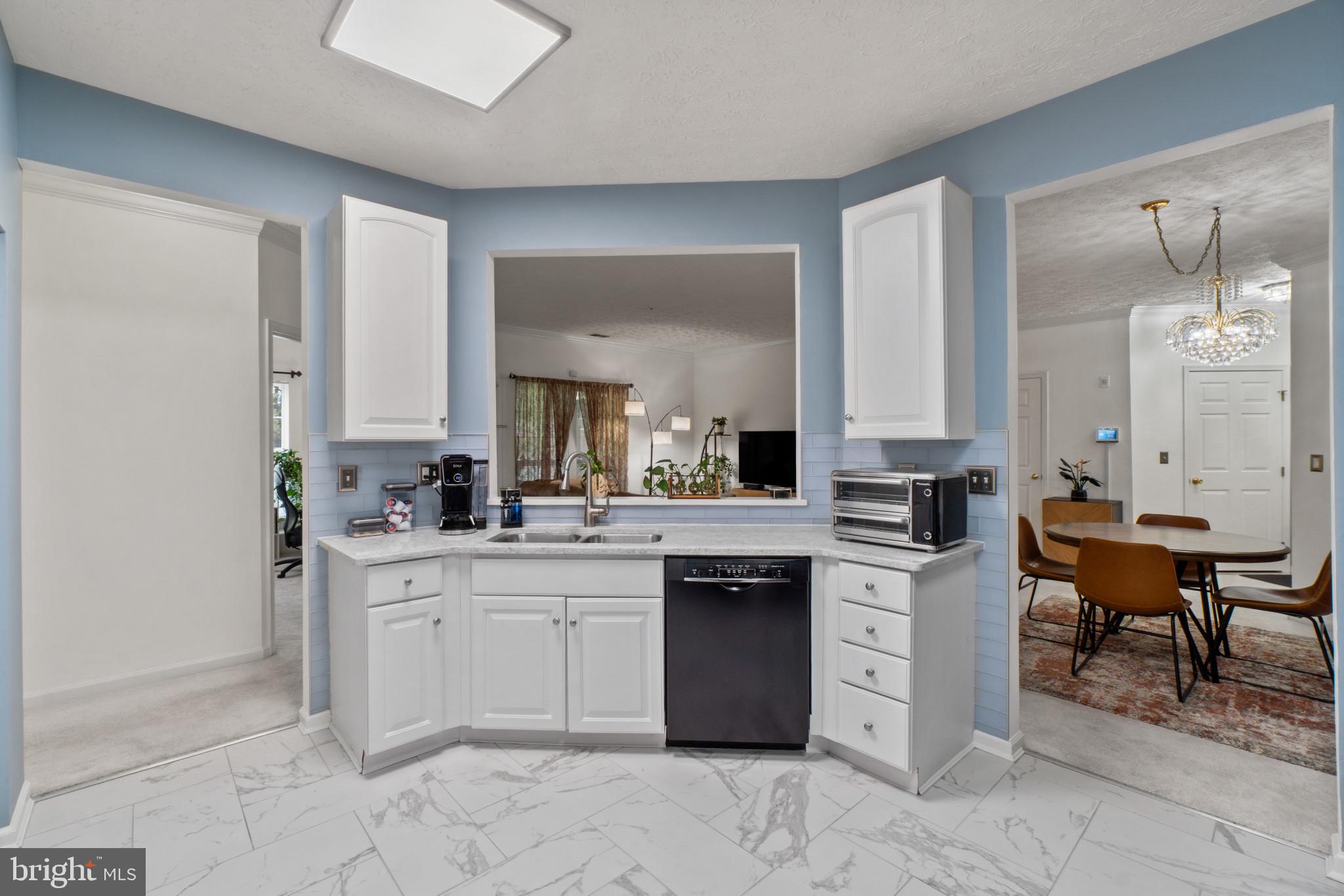 5144 Brightleaf Court, Unit 5144 Rosedale, MD 21237 - Photo 9 of 35 Charming kitchen with modern elegance.
