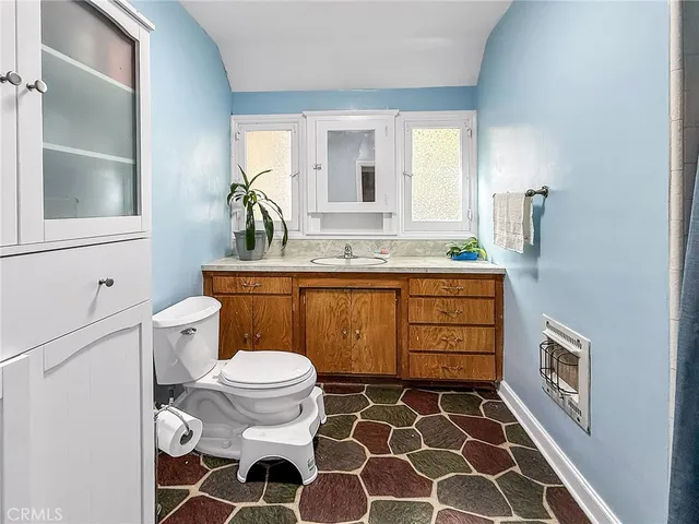 a view of a chairs and table in the patio