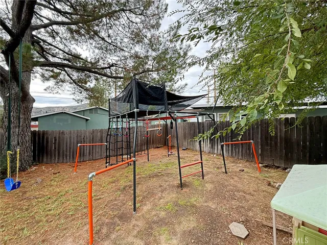 an aerial view of a house with a garden