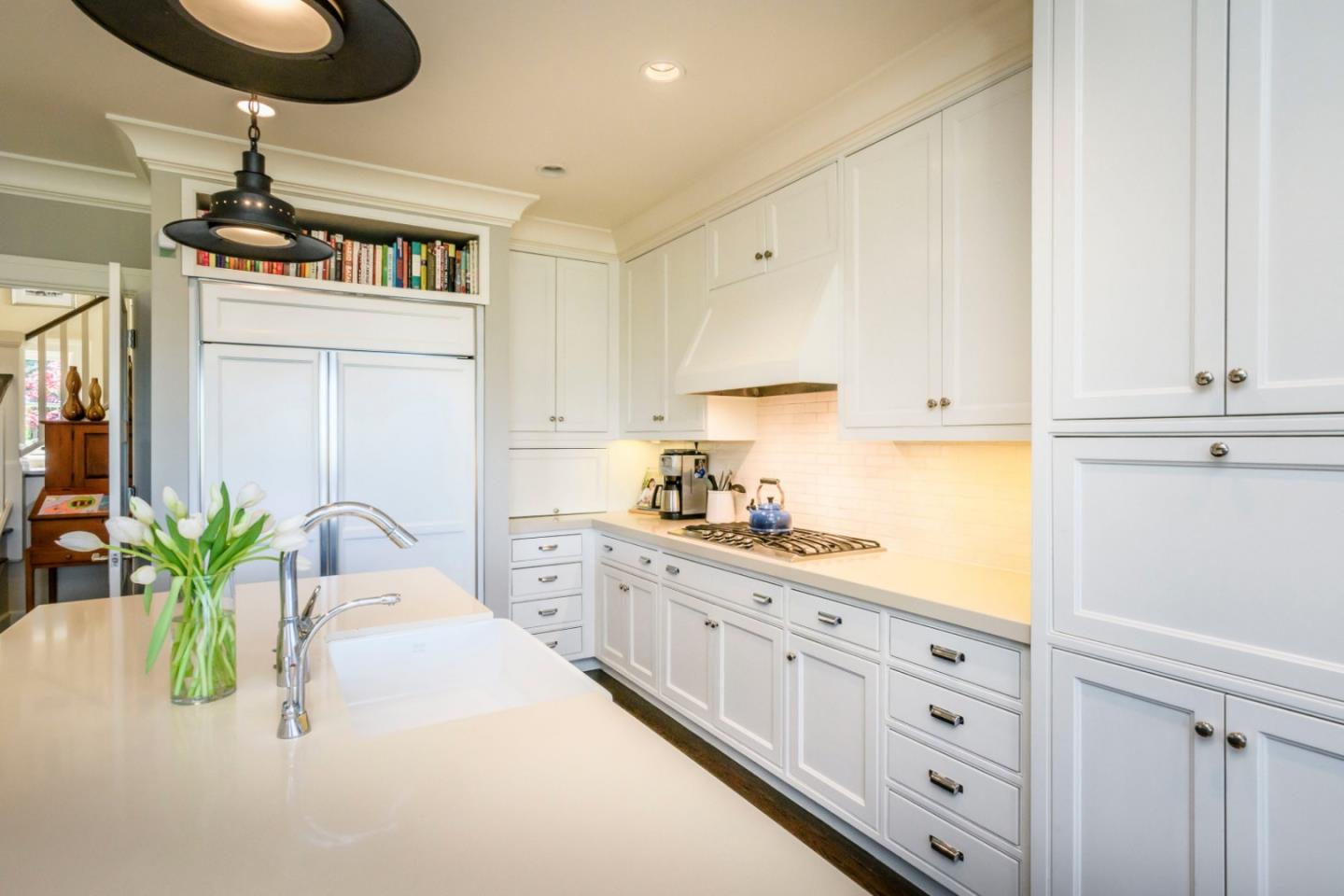 426 El Arroyo Road Hillsborough, CA 94010 - Photo 11 of 50 a kitchen with cabinets and window