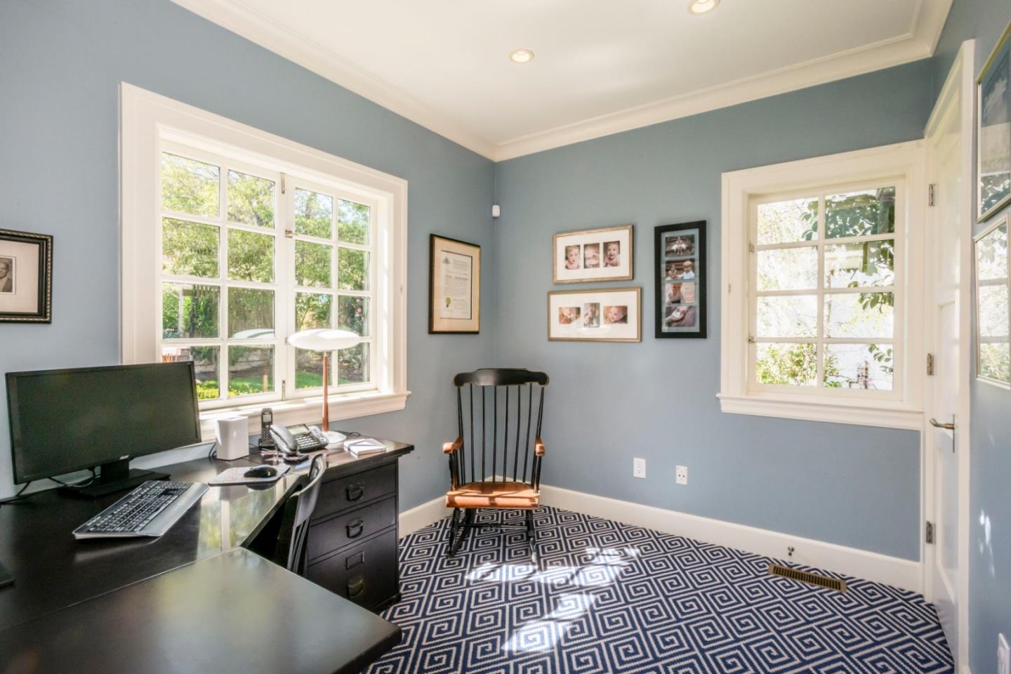 426 El Arroyo Road Hillsborough, CA 94010 - Photo 18 of 50 a living room with furniture and a flat screen tv