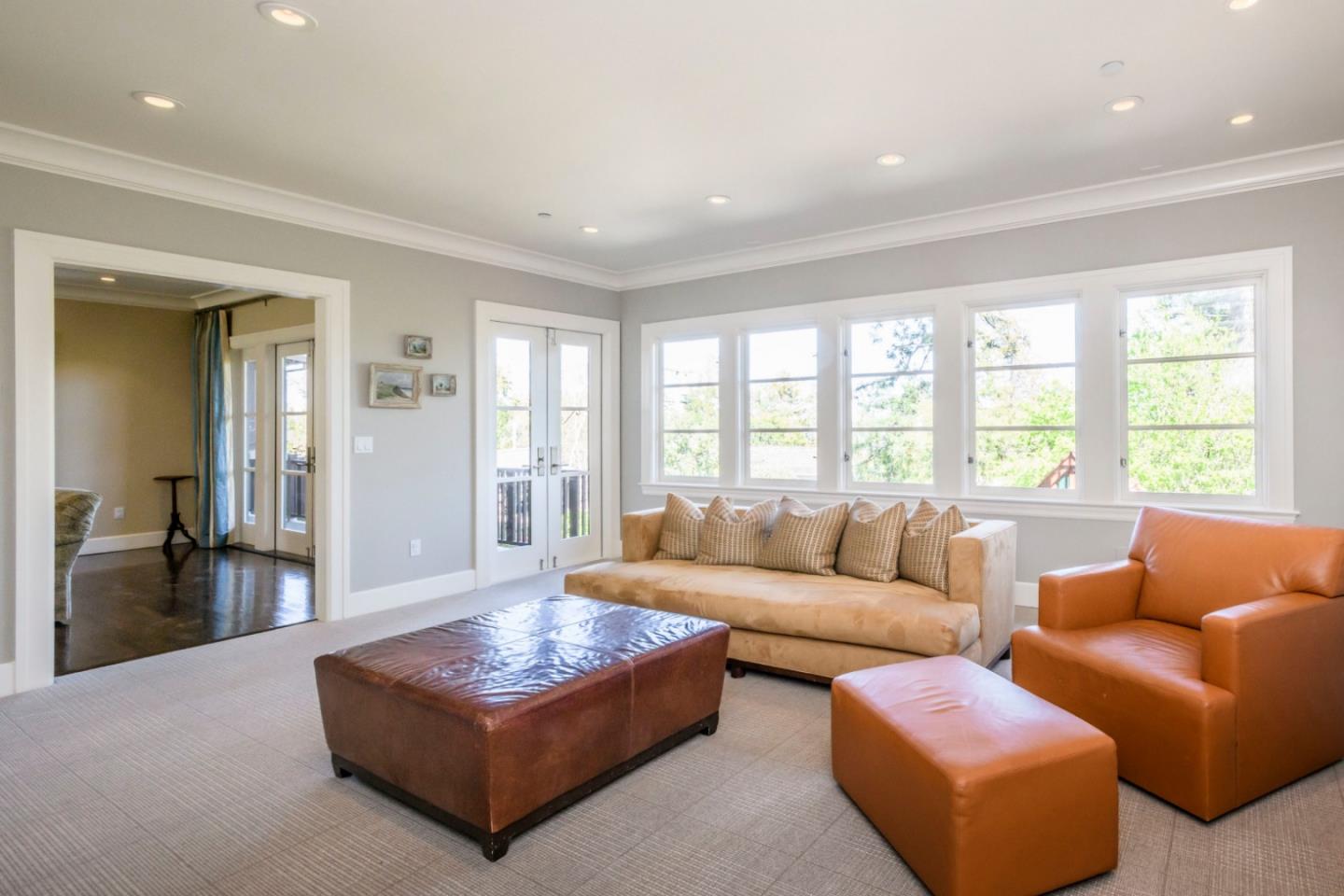 426 El Arroyo Road Hillsborough, CA 94010 - Photo 26 of 50 a living room with furniture and a large window
