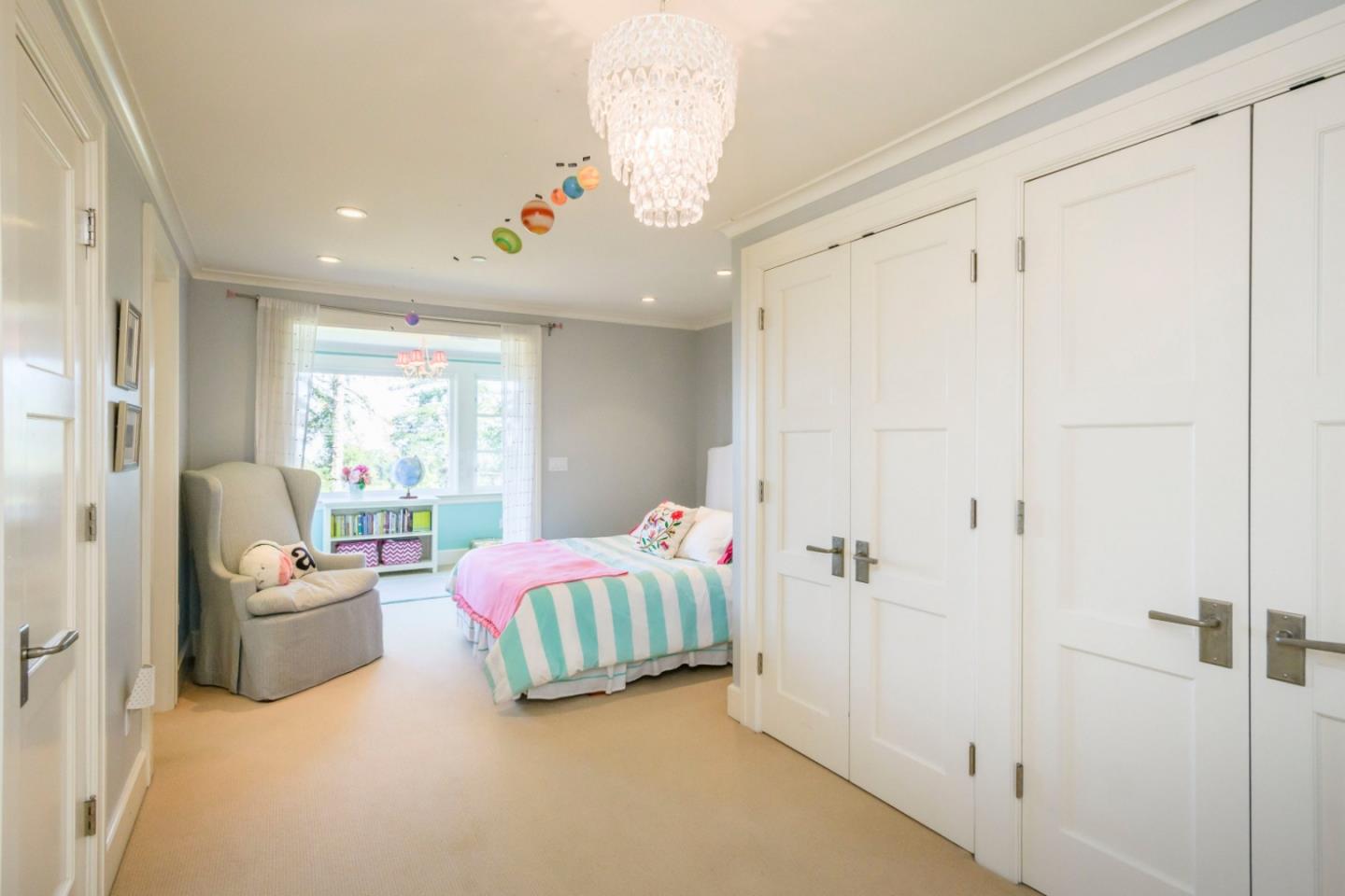 426 El Arroyo Road Hillsborough, CA 94010 - Photo 30 of 50 a living room with furniture and a large window