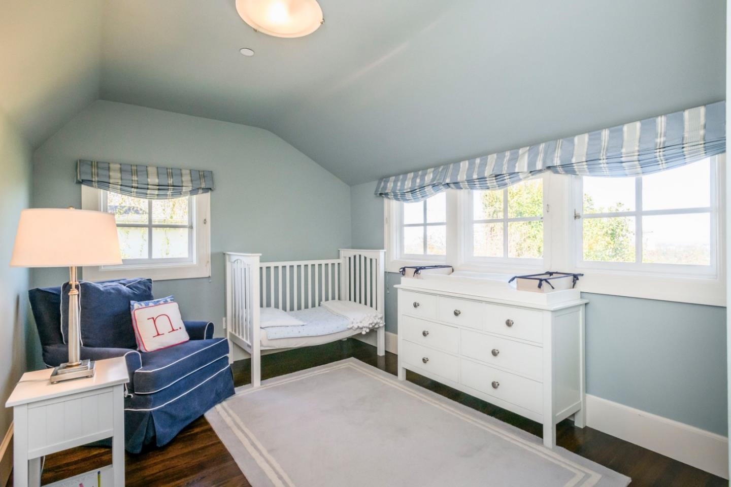 426 El Arroyo Road Hillsborough, CA 94010 - Photo 34 of 50 a bedroom with a bed and a window