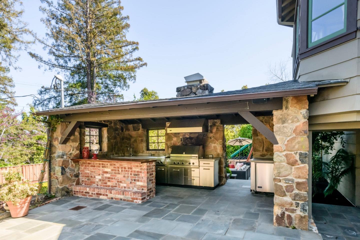426 El Arroyo Road Hillsborough, CA 94010 - Photo 40 of 50 a view of a car park in front of house