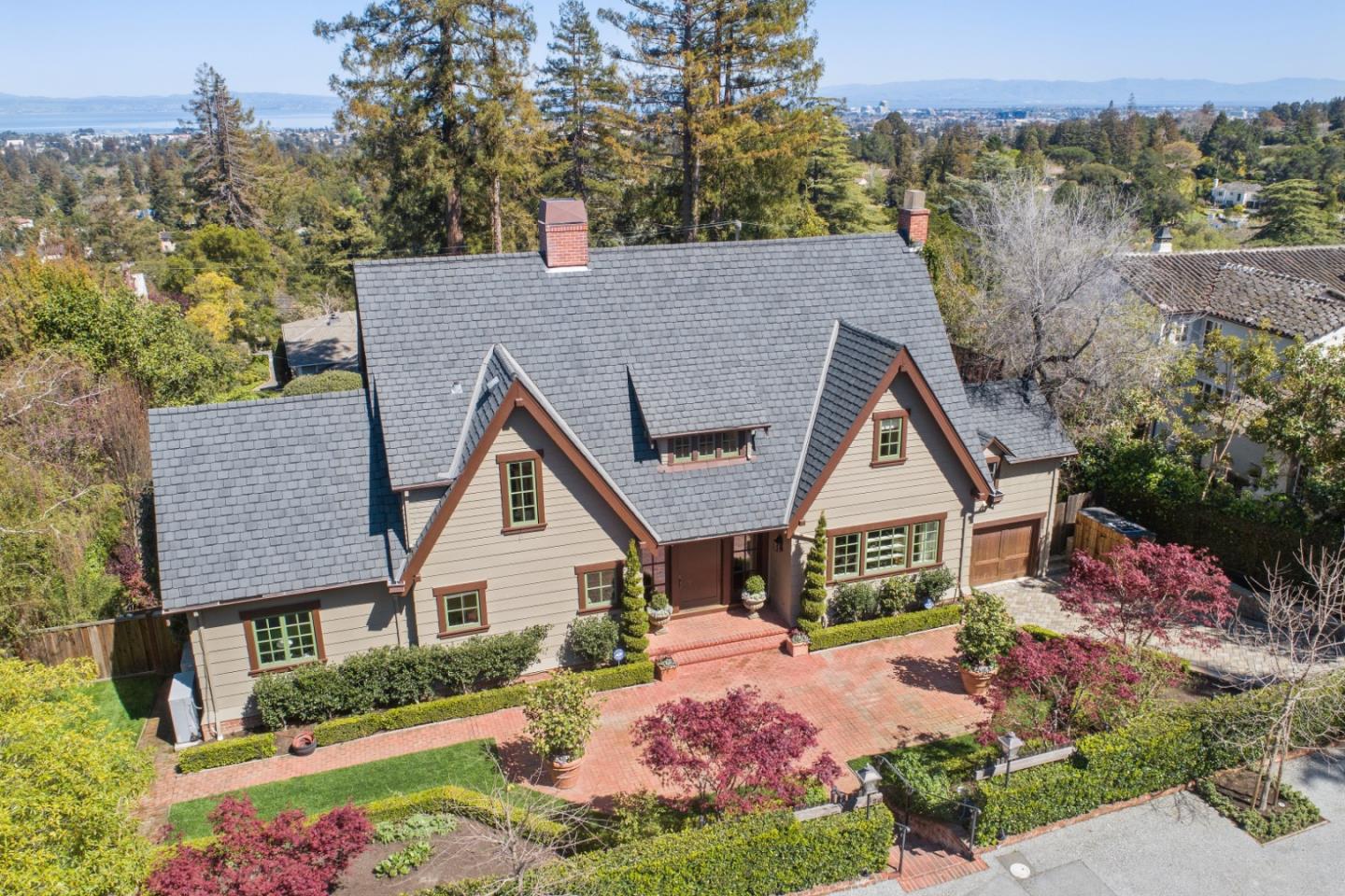 426 El Arroyo Road Hillsborough, CA 94010 - Photo 4 of 50 a front view of a house with garden