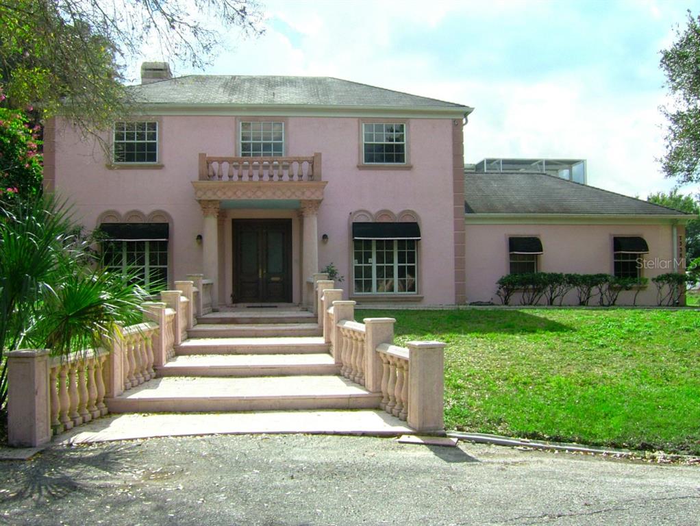 7338 Clark Road Sarasota, FL 34241 - Photo 1 of 1 a view of a house with a yard