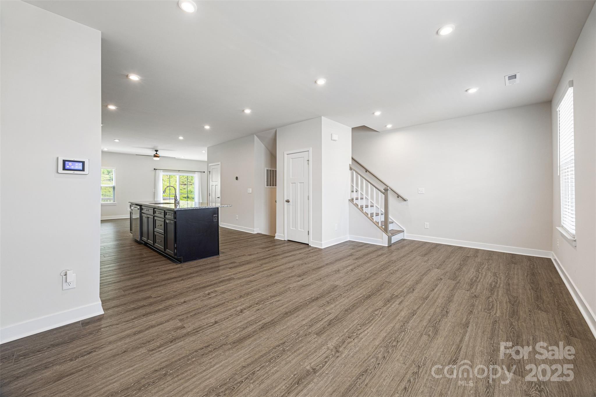 2040 Dornoch Road Tega Cay, SC 29708 - Photo 14 of 30 a view of kitchen and hall with wooden floor