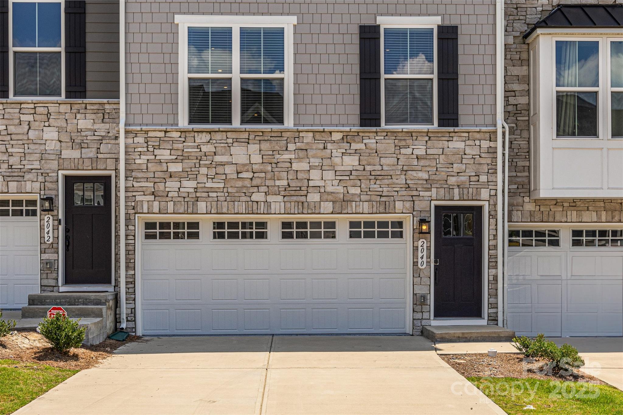 2040 Dornoch Road Tega Cay, SC 29708 - Photo 2 of 30 a front view of a house