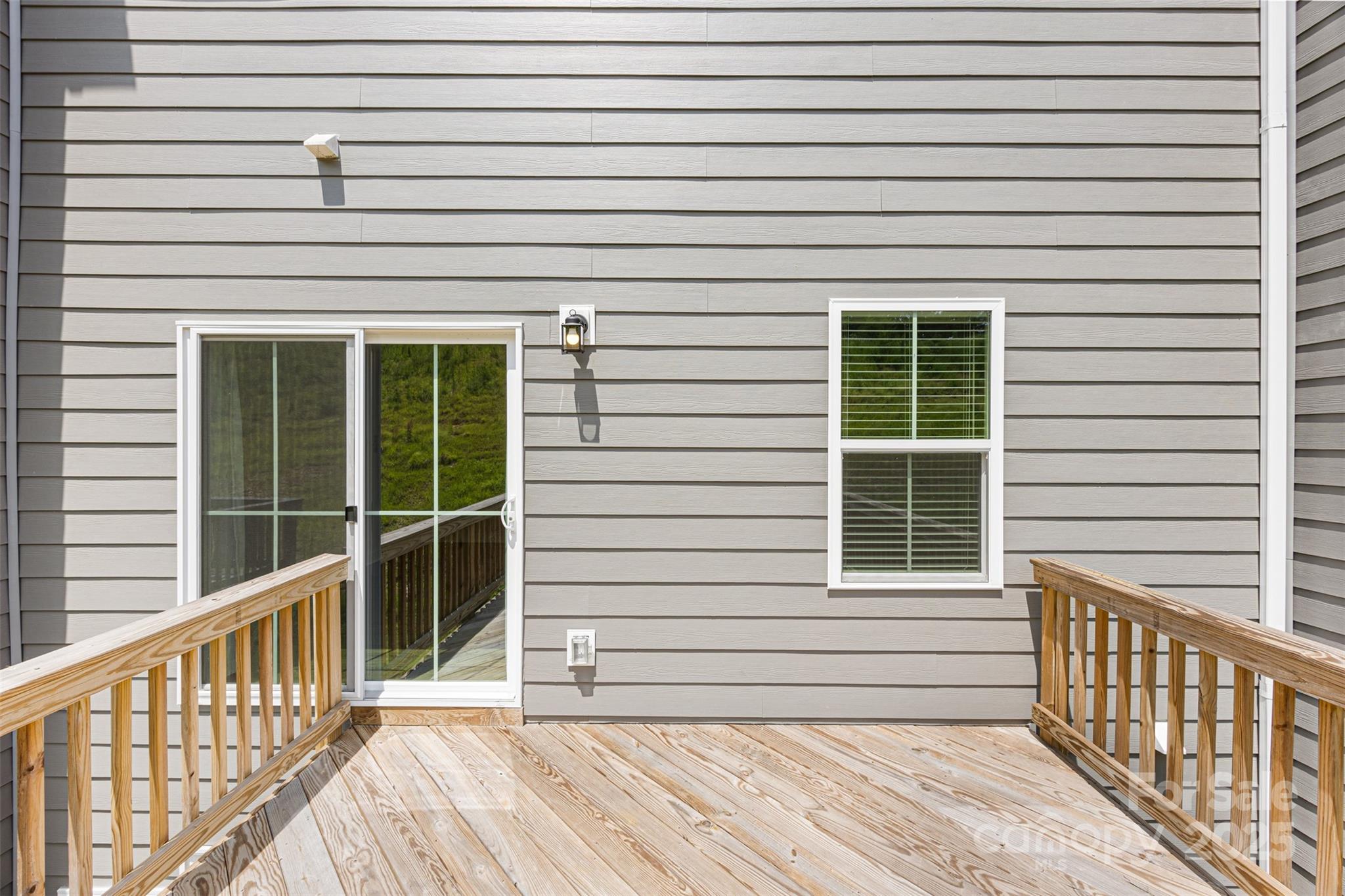 2040 Dornoch Road Tega Cay, SC 29708 - Photo 29 of 30 a view of a balcony with a window