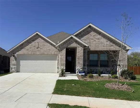 a front view of house with yard