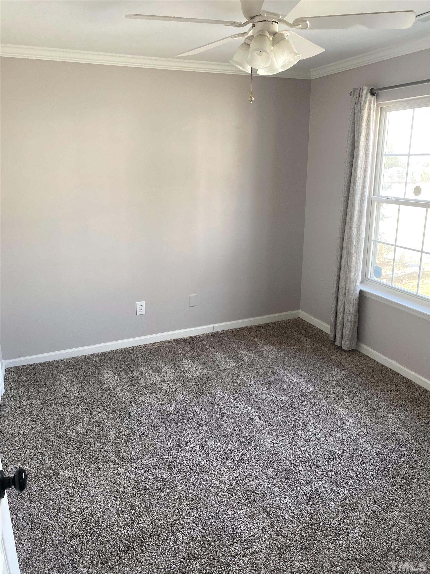 5104 Gable Ridge Drive Durham, NC 27713 - Photo 11 of 16 a view of an empty room with a window