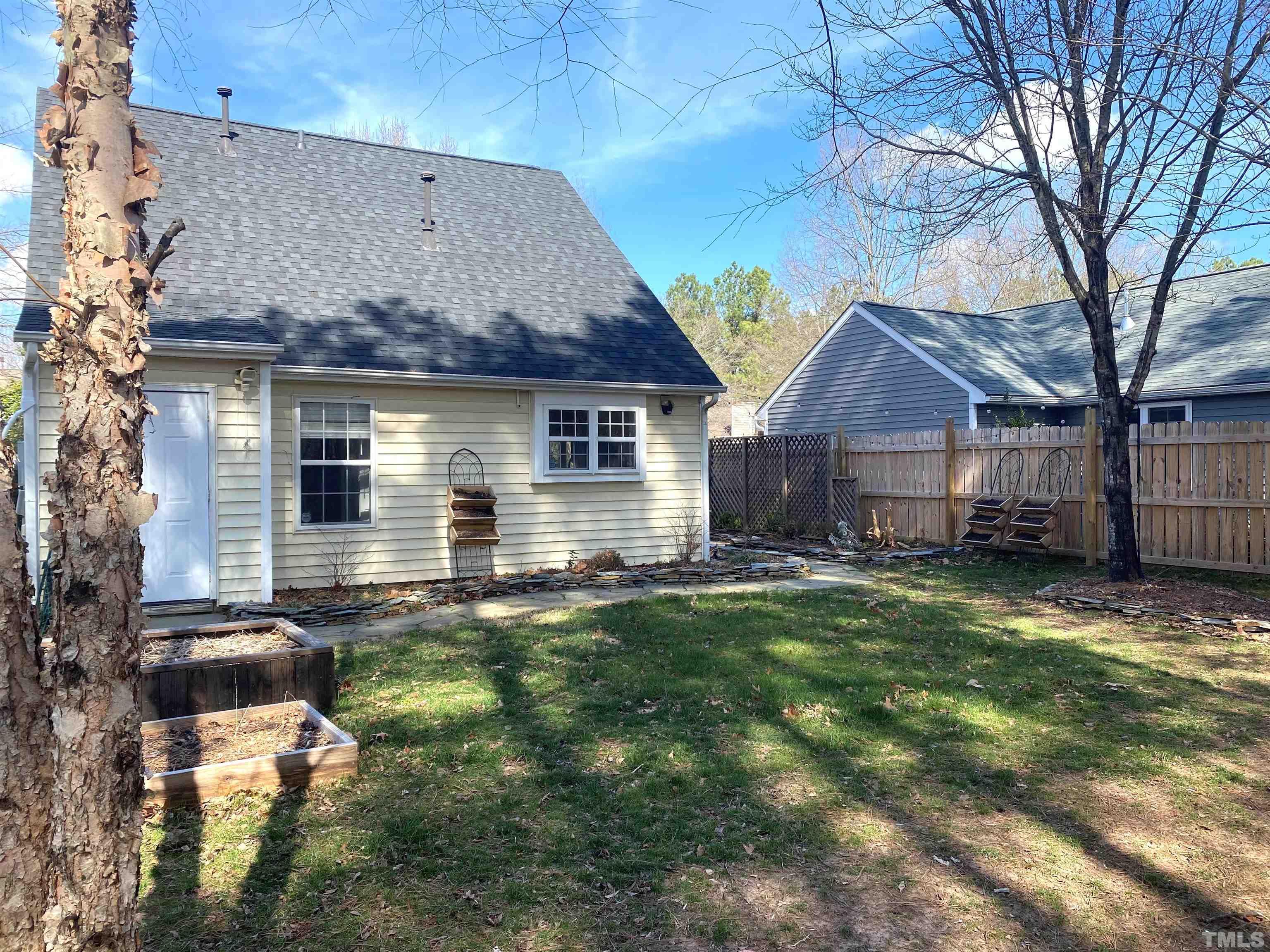 5104 Gable Ridge Drive Durham, NC 27713 - Photo 16 of 16 a view of a house with backyard