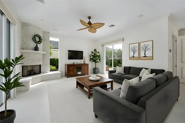 a living room with furniture and a window