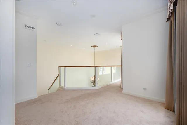 a spacious bedroom with a bed and a table