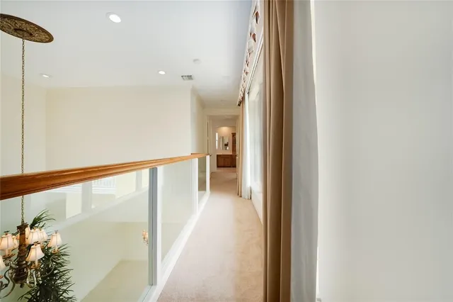 a bedroom with a bed couch and window