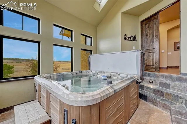 a view of a big house with a big yard