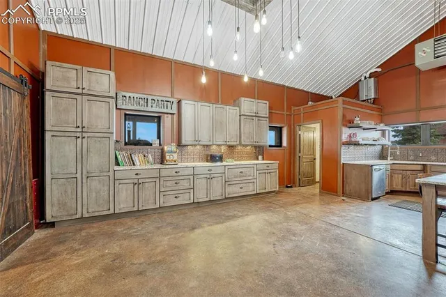 a bathroom with a granite countertop toilet sink and a mirror