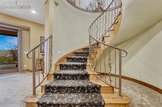 a view of entryway livingroom and hall with wooden floor