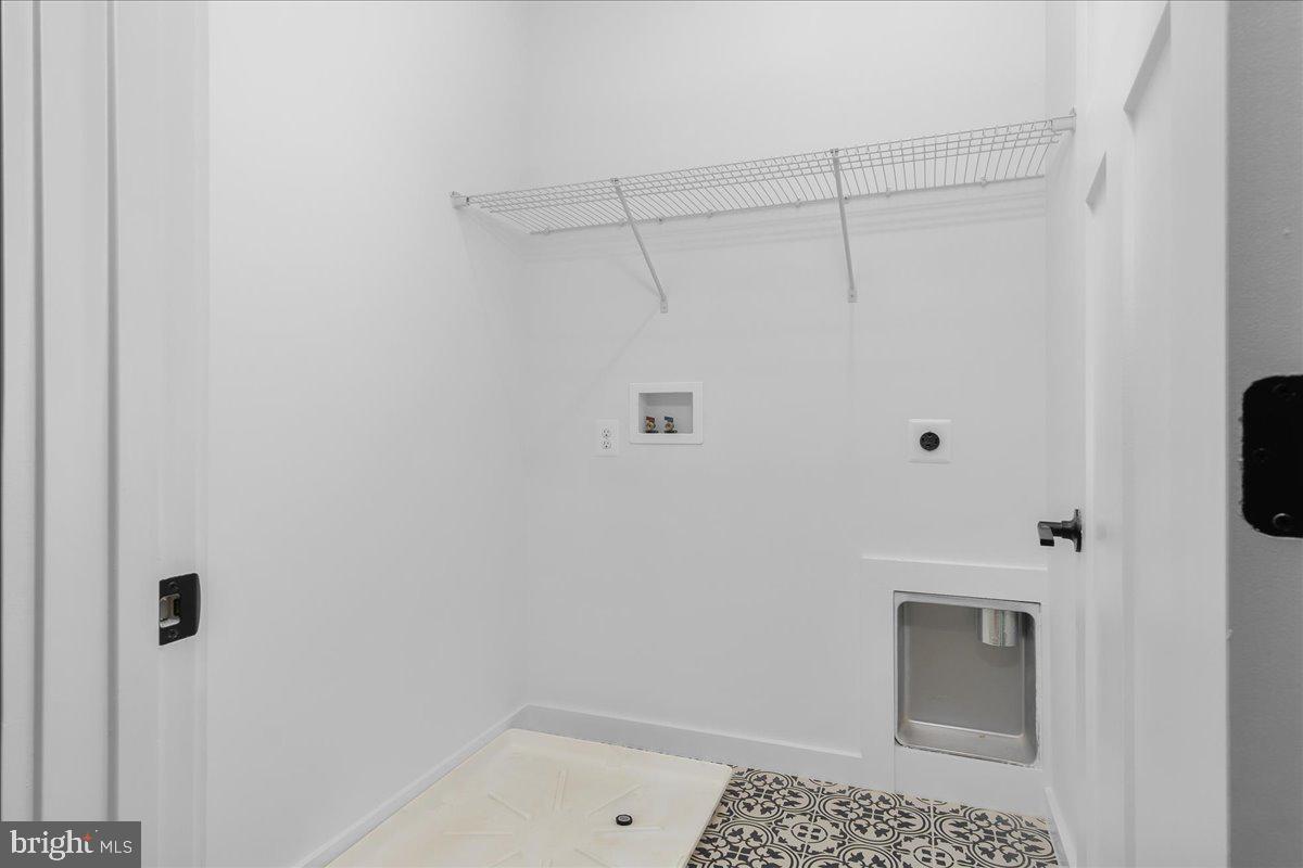 6508 Shady Side Road Shady Side, MD 20764 - Photo 25 of 35 a bathroom with a shower