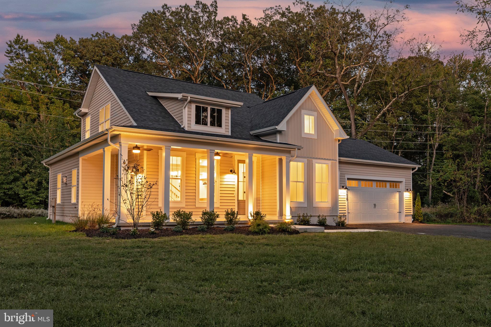 6508 Shady Side Road Shady Side, MD 20764 - Photo 27 of 35 a front view of house with yard and green space