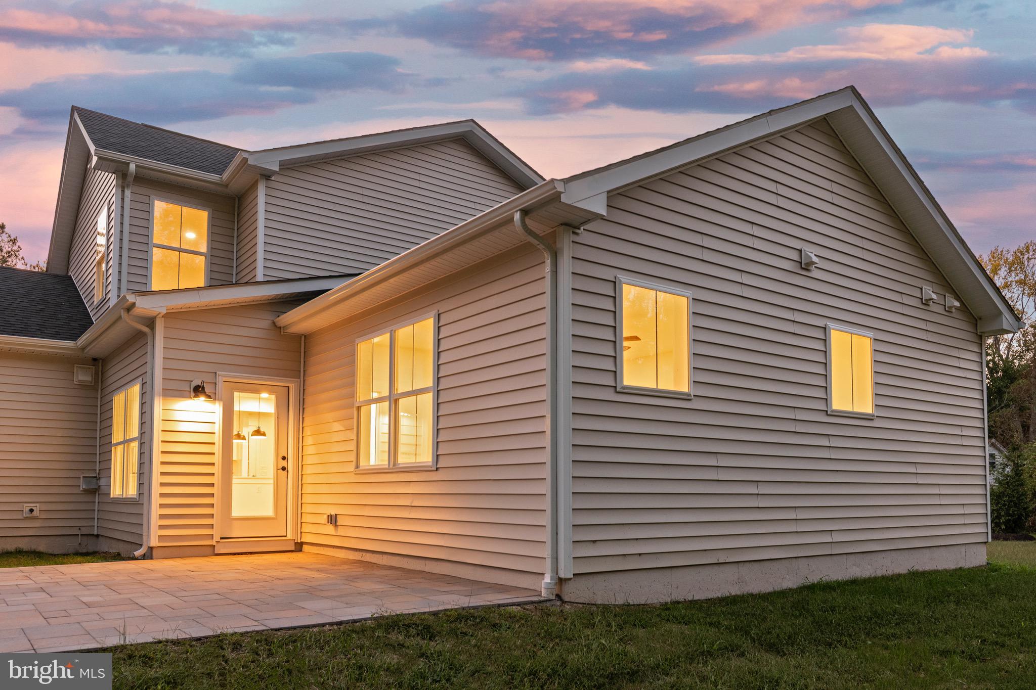 6508 Shady Side Road Shady Side, MD 20764 - Photo 31 of 35 a view of a house with a small backyard