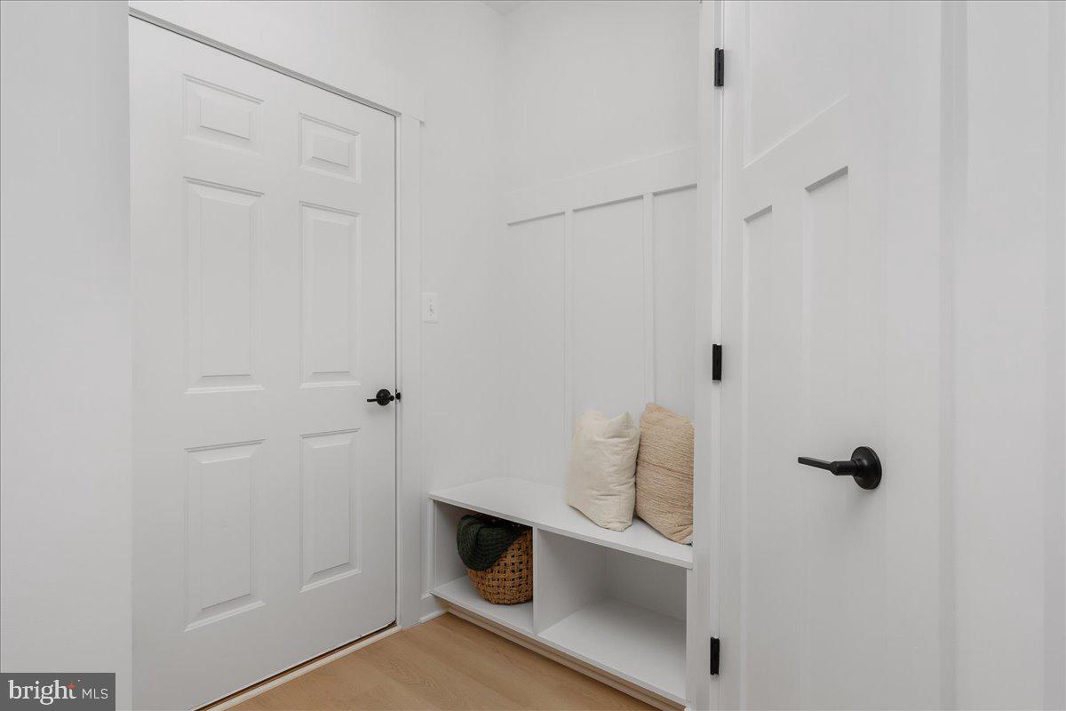6508 Shady Side Road Shady Side, MD 20764 - Photo 9 of 35 a view of an empty room with a fireplace