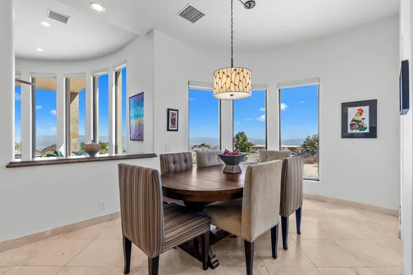 a living room with furniture fireplace and flat screen tv