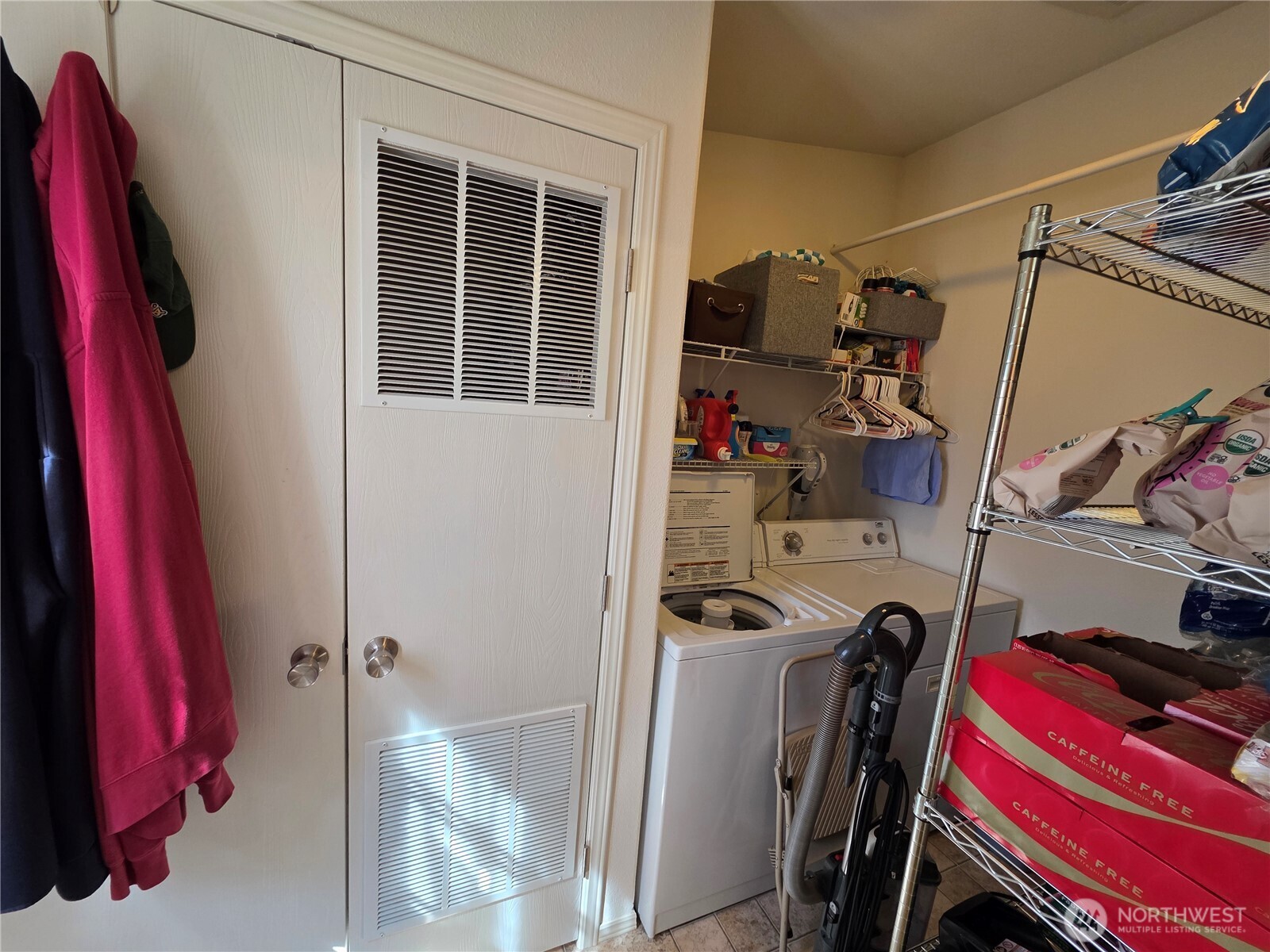 393 Summer Road Tonasket, WA 98855 - Photo 10 of 37 a view of a closet with storage