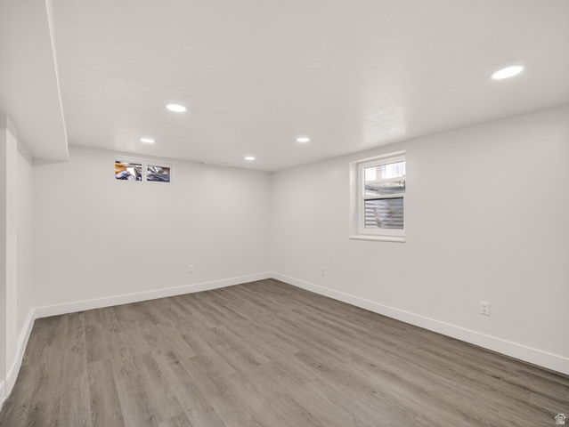 74 South 300 East Springville, UT 84663 - Photo 26 of 48 Bright room featuring wood-finish flooring, recessed lighting, and a white trim baseboard