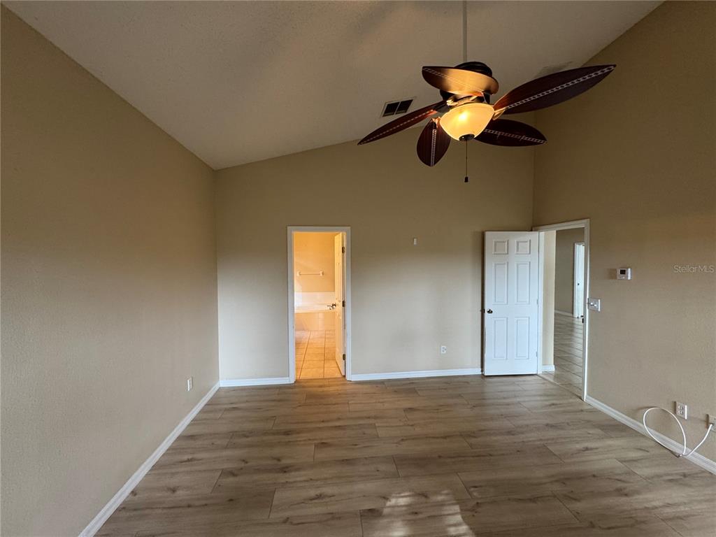 4190 Bear Gully Road Winter Park, FL 32792 - Photo 15 of 30 a view of a room with wooden floor