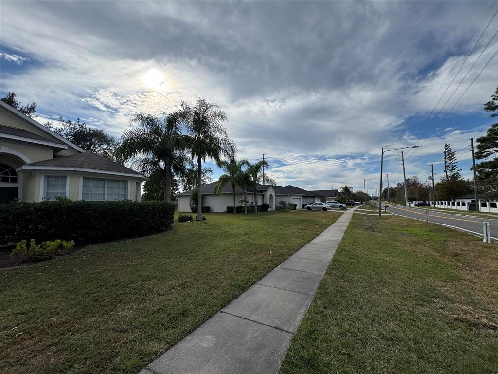4190 Bear Gully Road Winter Park, FL 32792 - Photo 29 of 30 a view of a house with a yard