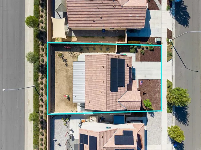 front view of house with a potted plant
