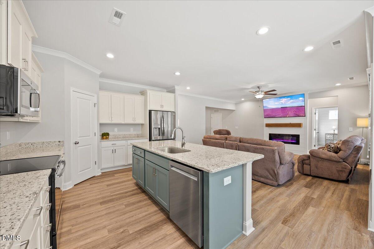 189 Red River Drive Selma, NC 27576 - Photo 31 of 31 a large kitchen with stainless steel appliances lots of counter top space