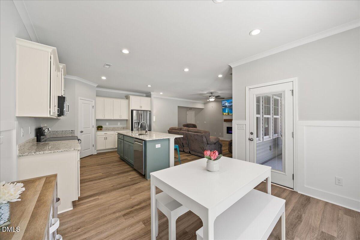 189 Red River Drive Selma, NC 27576 - Photo 14 of 31 a large kitchen with a table and chairs