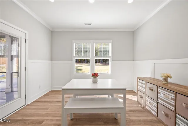 a large kitchen with stainless steel appliances lots of counter top space