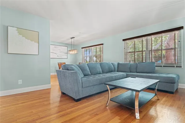 a kitchen with stainless steel appliances granite countertop a refrigerator stove and microwave