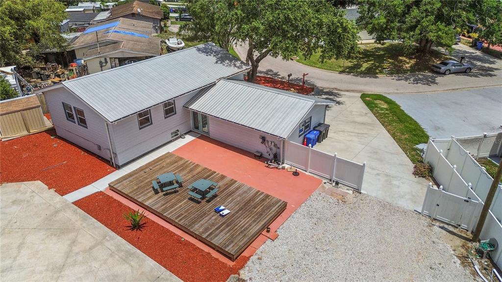 6515 Dimarco Road Tampa, FL 33634 - Photo 66 of 67 an aerial view of a house with a backyard