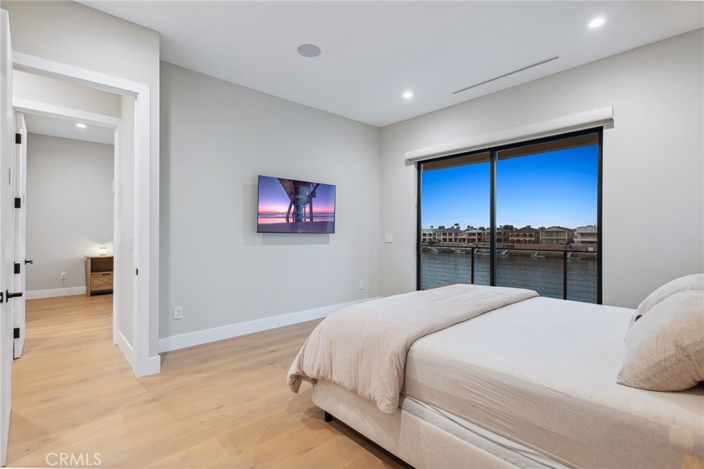 908 Beach Needles, CA 92363 - Photo 11 of 28 a bedroom with a large bed and a view of bathroom