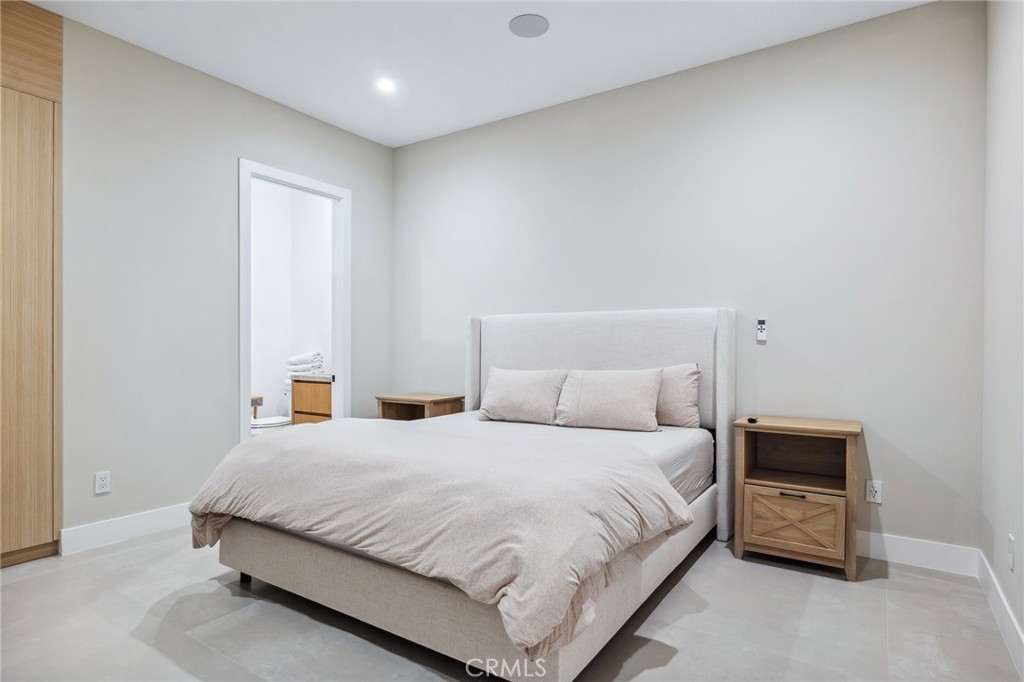 908 Beach Needles, CA 92363 - Photo 14 of 28 a bedroom with a bed and a night stand