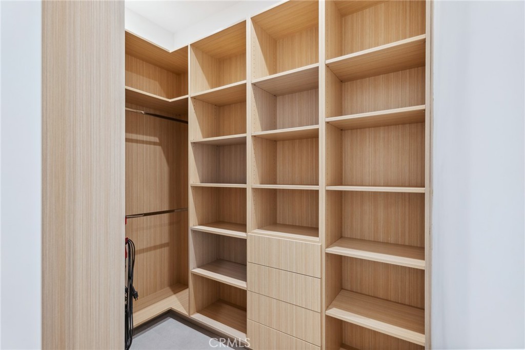 908 Beach Needles, CA 92363 - Photo 18 of 28 a view of walk in closet with empty racks