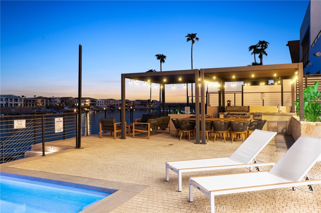 908 Beach Needles, CA 92363 - Photo 21 of 28 a view of a swimming pool with chairs