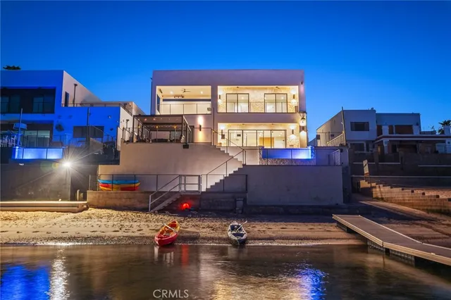 a living room with furniture with a flat screen tv