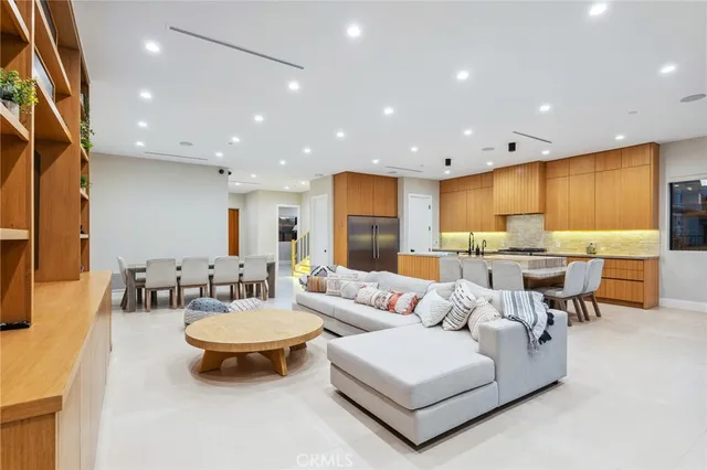 a living room with furniture and a table