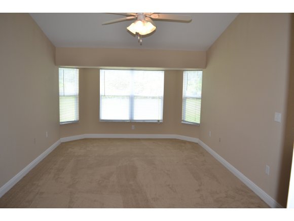 449 Southwest Scanlon Palm Bay, FL 32908 - Photo 8 of 12 a view of an empty room with a window