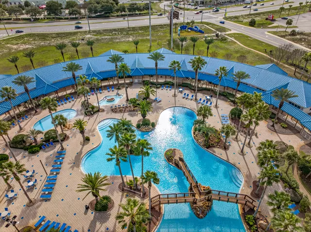 an aerial view of a chairs and table on the terrace